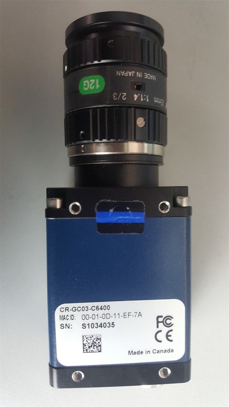 Machine-vision camera with a C-mount lens (illustrative product image)